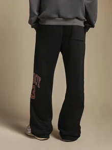 PLAYBOY X SUMWON 53 Varsity Graphic Wide Leg Sweatpants With Bold Leg Print And Relaxed Fit For Casual Everyday Wear - Black - View 2