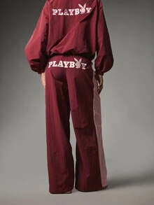 Missguided x Playboy بنطلون جوجر بساق واسعة مع لوجو أرنب ولوحة جانبية ملونة وخصر مطاطي لفصل الخريف والشتاء - عنابي اللون - مشاهدة 1