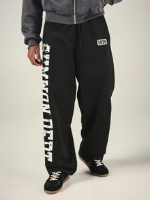 SUMWON Oversized Wide Leg Black Sweatpants With Bold Vertical Side Leg Logo Print And Drawstring Waist - Black - View 4