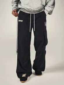 SUMWON Wide Leg Black Cargo Track Pants With Contrast Side Stripe Drawstring Waist And Thigh Pocket Logo Detail - Black - View 1