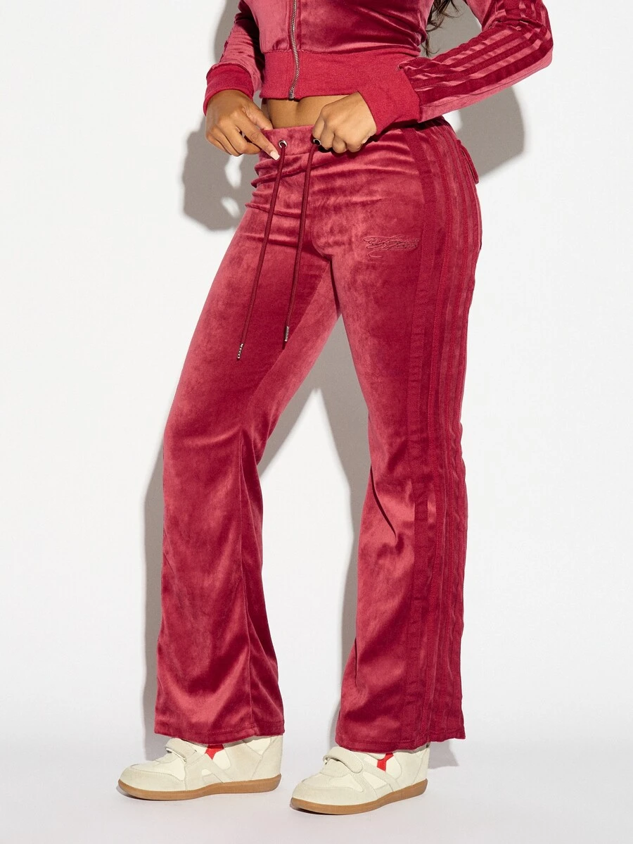 SUMWON WOMEN Velvet Flared Track Pants With Side Stripe Detail Low Rise Drawstring Waist And Tonal Embroidered Logo Patch Pockets Full Length - Red - View 1