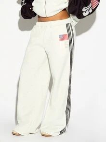 SUMWON WOMEN Oversized Wide Leg Fleece Sweatpants With American Flag Patch Side Stripe Detail And Varsity Number Print Relaxed Fit Full Length - Grey - View 1
