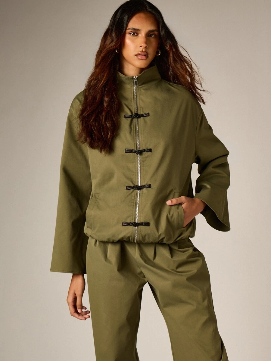 AiiRZ Oversized Military-Inspired Jacket With Stand Collar Full-Length Zipper And Decorative Frog Clasp Closures Wide Sleeve Hip Length Outerwear - Army Green - View 1