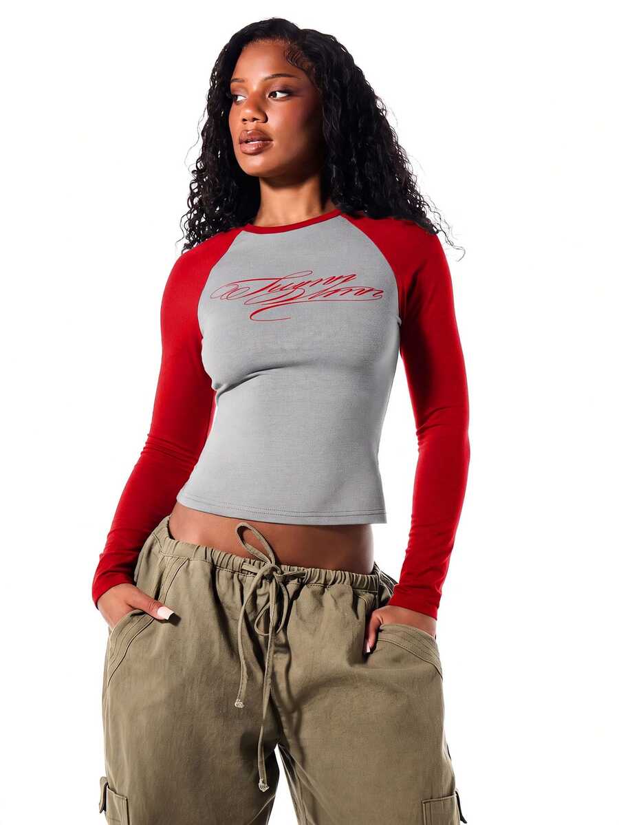 SUMWON WOMEN Cropped Raglan Long Sleeve Top With Contrast Red Sleeves And Cursive Script Logo Print On Chest Crew Neck Fitted Tee - Red - View 1