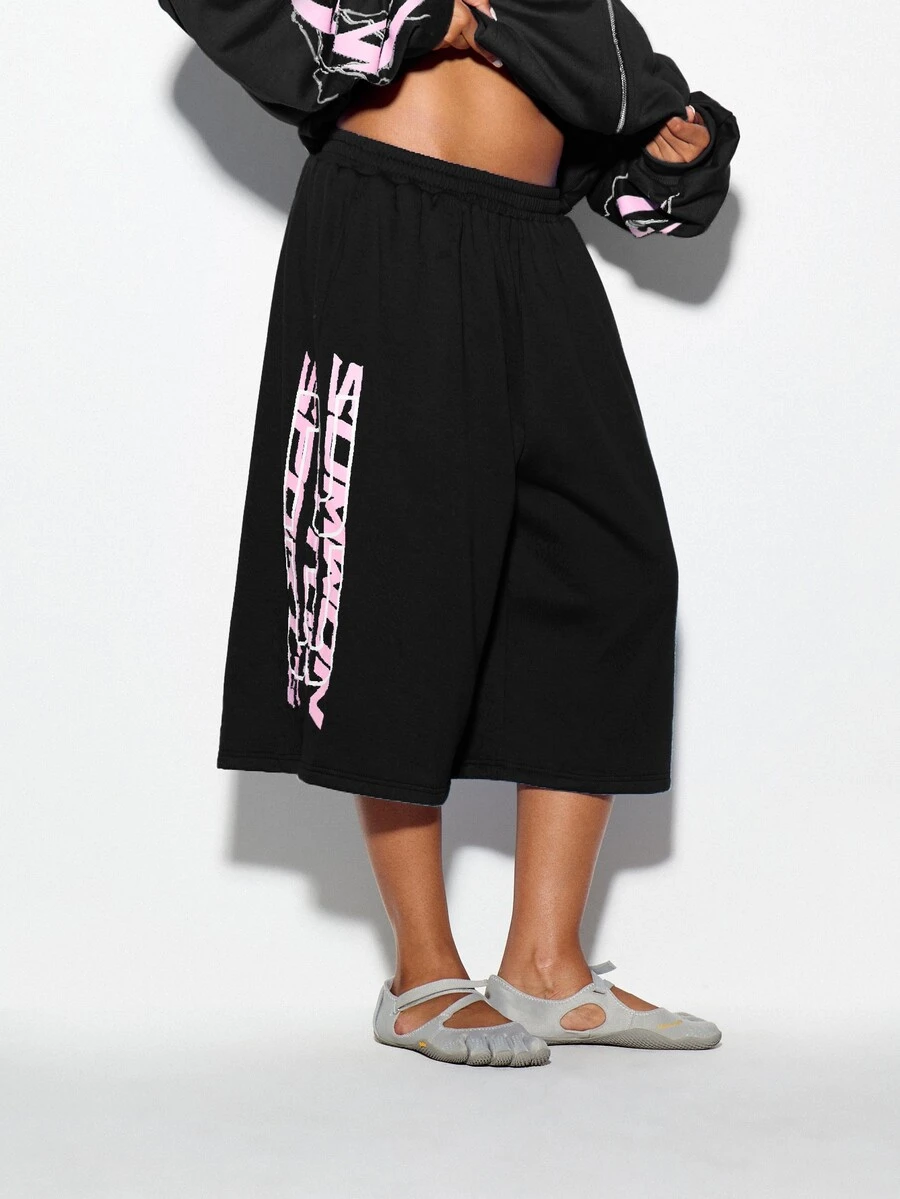 SUMWON WOMEN Oversized Wide Leg Sweat Shorts With Vertical Logo Print Elastic Waist Longline Bermuda Style Drop Crotch Casual Loungewear - Black - View 1