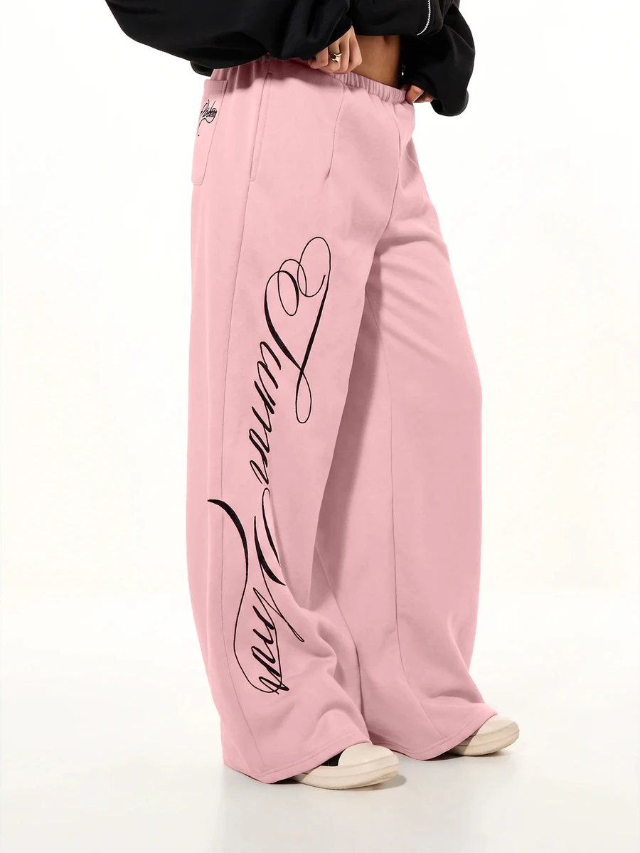 SUMWON WOMEN Oversized Wide Leg Sweatpants With Cursive Script Graffiti Print And Elastic Waist Relaxed Fit Lounge Trousers For Spring - Baby Pink - View 1