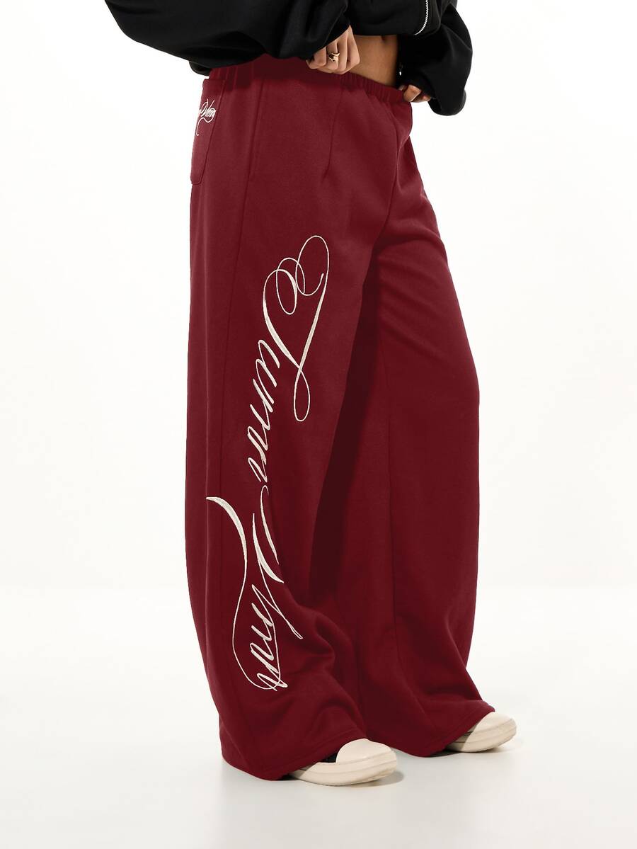 SUMWON WOMEN Wide Leg Sweatpants With Oversized Cursive Script Print And Heart Motif, Elastic Waist, Side Pockets, Relaxed Fit Lounge Pants - Burgundy - View 1