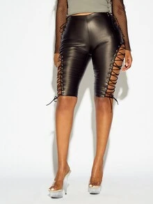 SUMWON WOMEN Faux Leather High Rise Cycling Shorts With Side Lace-Up Eyelet Detail Knee Length Bodycon Biker Shorts Summer Festival Party Night Out Halloween - Black - View 1
