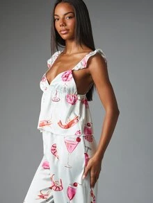 MISSGUIDED طقم ساتان من قطعتين بتصميم متناسق، توب كامي بياقة قلب مع حمالات مكشكشة وبنطلون واسع الساق، بطبعة ديسكو مبتكرة، لحفلات الصيف - متعدد الألوان - مشاهدة 5