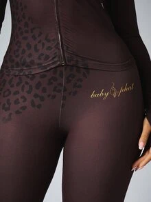 BABYPHAT Gold Script Logo Flared Leggings With Leopard Print Waistband Mid Rise Full Length Holiday Party Pants - Brown - View 6