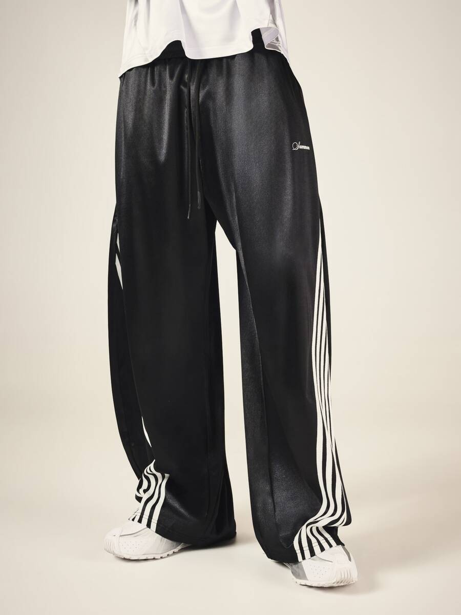 SUMWON Wide Leg Satin Track Pants With Side Stripe Contrast Detailing Drawstring Waist And Script Logo Print - Black - View 1