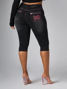 BABYPHAT Embroidered Logo Cropped Skinny Capri Jeans With Pink Contrast Stitching Zip Pockets And Split Hem Detail - Black - View 1