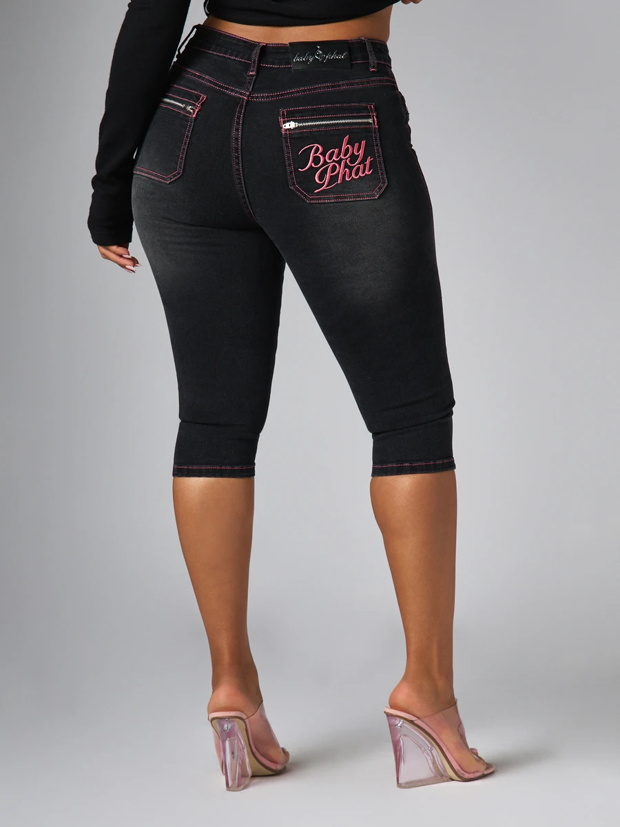 BABYPHAT Embroidered Logo Cropped Skinny Capri Jeans With Pink Contrast Stitching Zip Pockets And Split Hem Detail - Black - View 1