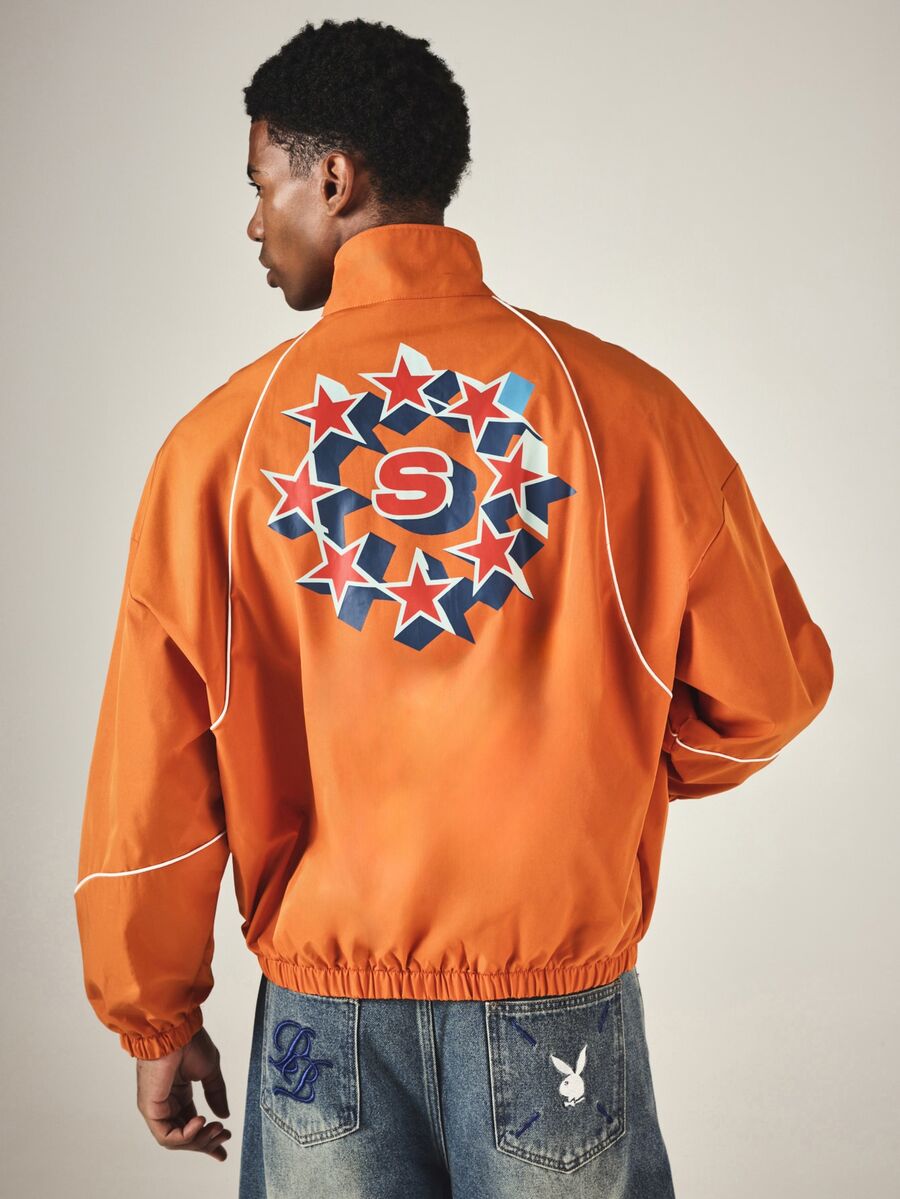 SUMWON Oversized Windbreaker Jacket With Full Zip Closure Varsity Applique Lettering Star Graphic Back Print And White Contrast Piping - Orange - View 1