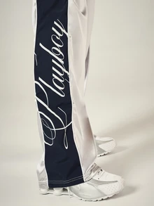 PLAYBOY X SUMWON Script Logo Wide Leg Track Pants With Color Block Navy Side Panel And Drawstring Waist Full Length Satin Finish - Multicolor - View 6