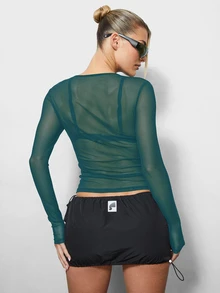 SUMWON WOMEN Sheer Mesh Long Sleeve Crop Top With Round Neck And Thumbhole Cuffs - Semi Transparent Fitted Layering Top - Teal Blue - View 2