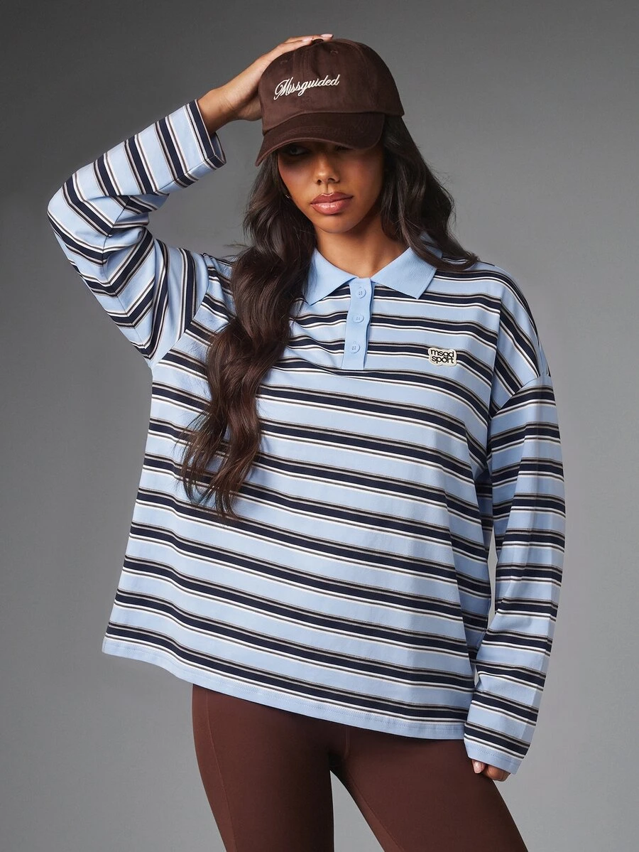 MISSGUIDED Sport Oversized Long Sleeve Polo Shirt With Striped Print Polo Collar Button Placket And Badge Logo Detail - Blue - View 1