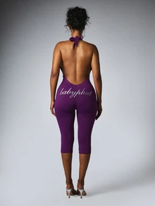 BABYPHAT Halter Neck Backless Capri Jumpsuit With Silver Rhinestone Trim And Signature Script Logo Detail - Purple - View 1