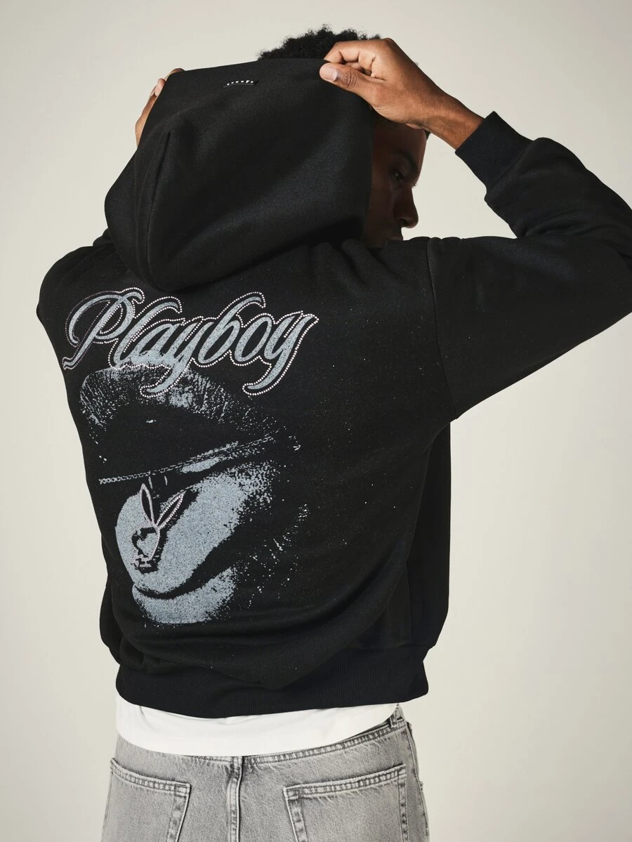 PLAYBOY X SUMWON Oversized Pullover Hoodie With Rhinestone Script Back Graphic And Bunny Logo Chest Print - Black - View 1