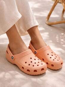 Crocs حذاء نسائي كلاسيكي كهربائي حجر الشمس 10001 - Electric Sunstone - مشاهدة 1