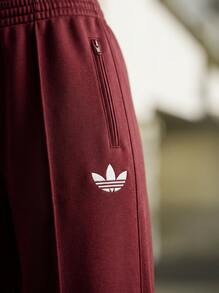 Adidas بنطلون رياضي فضفاض للنساء من Adicolor Classic Firebird بلون أحمر قرمزي - الأحمر - مشاهدة 6