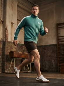 Puma جاكيتات رياضية Essentials T7 Poly للرجال باللون الأخضر - Emerald Ice - مشاهدة 7