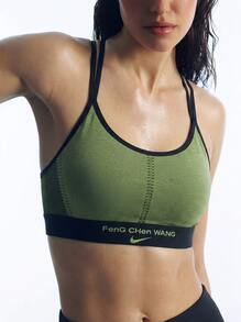 Nike 女款運動內衣 透氣舒適柔軟 健身訓練用 黑色 DV4019-010 - 黑色/活力綠 - 查看 1