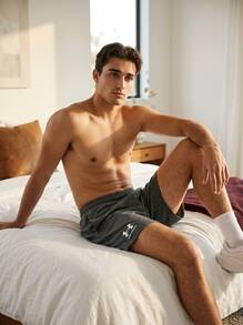 Under Armour شورتات رياضية للرجال مرنة وخفيفة الوزن متعددة الاستخدامات للجري والشاطئ والرياضة 1382427-025 - رمادي - مشاهدة 2
