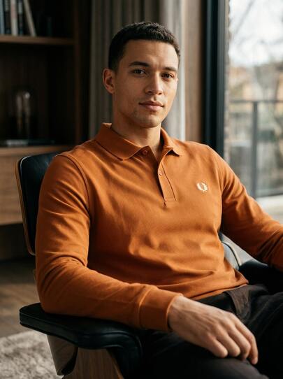 Fred Perry قميص بولو بأكمام طويلة برتقالي للرجال