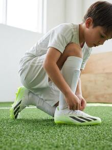 Adidas بوت كرة قدم للأطفال للأرض الصلبة X Crazyfast.1 لون أبيض سحابي / أسود أساسي / ليمون لامع IE4208 - أبيض وأسود - مشاهدة 6