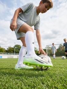 Adidas بوت كرة قدم للأطفال للأرض الصلبة X Crazyfast.1 لون أبيض سحابي / أسود أساسي / ليمون لامع IE4208 - أبيض وأسود - مشاهدة 4