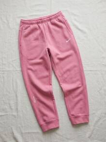 Nike بنطلون رياضي رجالي من نوكتا باللون الوردي - Desert Berry/Elemental Pink - مشاهدة 2
