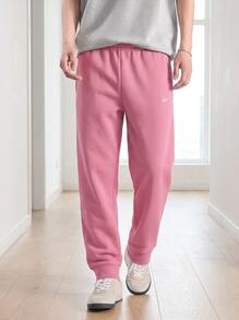 Nike بنطلون رياضي رجالي من نوكتا باللون الوردي - Desert Berry/Elemental Pink - مشاهدة 1