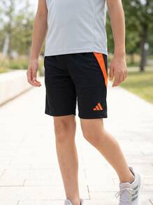 Adidas شورتات أولاد مراهقين سريعة الجفاف وماصة للرطوبة متينة لعطلة نهاية الأسبوع والصيف والجيم JJ1163 - Black Orange - مشاهدة 1