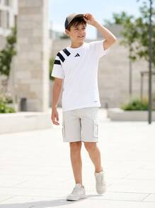 Adidas قمصان أولاد مراهقين ماصة للرطوبة وقابلة للتنفس بقصة كلاسيكية للاستخدام اليومي وعطلة نهاية الأسبوع والتدريب IK5742 - أبيض - مشاهدة 6