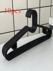 SHEIN 1 قطعة/10 قطع/20 قطعة/40 قطعة شماعة بلاستيكية بسيطة للمنزل مانعة للانزلاق، حامل ملابس، رف تجفيف الملابس، مع مشبك تعليق بدون آثار وخطاف، باللونين الأسود والأبيض - الأسود - مشاهدة 8