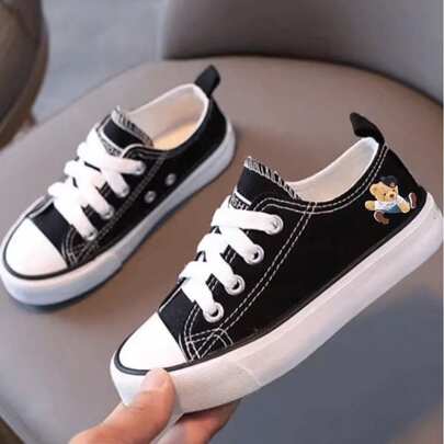 Tenis para niños niñas unisex zapatos de lona a la moda para niñas, detalle de oso primavera 2026, nuevos zapatos casuales cómodos de suela suave para niños, zapatos de tablero para padres e hijos 12-21 mx color negro con suela blanca