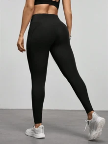 Pantalones cortos deportivos de cintura alta con bolsillos, ajustados y de corte slim para mujer - Negro - Ver 5