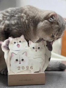 1本可爱小猫咪日历 - 月度计划本，包含萌萌的猫咪图案，涵盖2026年1月至12月 - 适用于家庭、办公室、学校 - 是送给爱猫人士和宠物主人的理想礼物 - 俏皮小猫咪主题，纸质材料，英文版式，月度布局，月度计划本 | 趣味设计 | 纸质，猫咪日历 - 彩色 - 查看 10