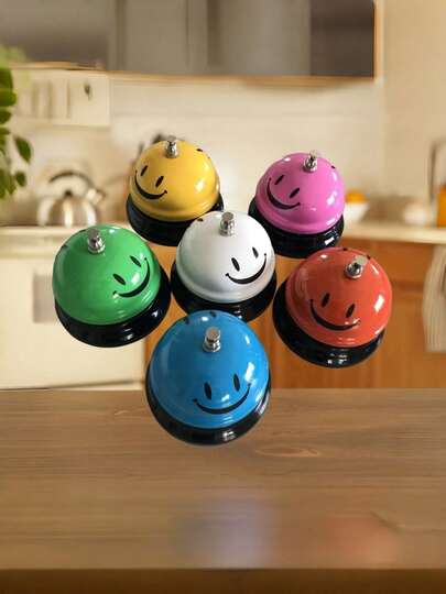 1个呼叫铃，桌面铃，服务铃，直径笑脸造型，金属防锈结构，适用于前台、酒店、餐厅、办公室、学校等场所。
