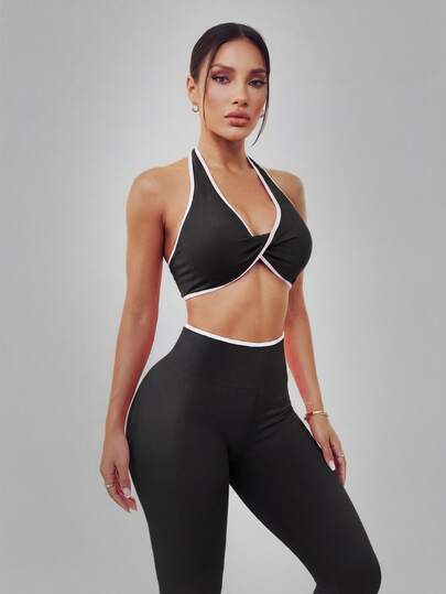 Conjunto deportivo de mujer con top halter cruzado y leggings de cintura alta, diseño ajustado, cómodo y elástico, ideal para fitness, yoga y entrenamiento diario