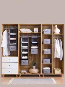 悬挂式衣柜收纳整理架 – 可折叠悬挂式收纳架，适用于橱柜、衣柜和壁橱。节省空间的卧室收纳方案，采用抽屉式收纳单元和多层无纺布悬挂式收纳袋。可用于存放鞋子、衣物和厨房用品。灰色亚麻图案，兼具家居装饰、房间装饰和秋季装饰功能。多功能悬挂式收纳架。 - 灰色 - 查看 7