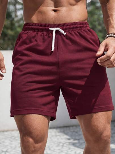 Short deportivo negro para hombre con ajuste slim, cintura elástica con cordón, tela ligera y transpirable, estilo urbano fitness, ideal para gym, verano y uso diario