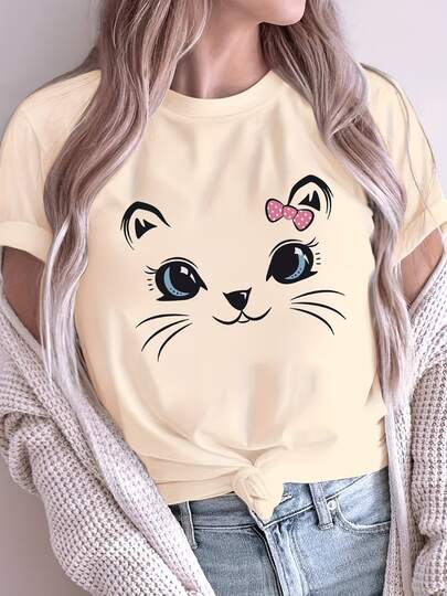 Camiseta de manga corta y cuello redondo para mujer, con estampado de cara de gato adorable con lazo de lunares, ropa casual cómoda para looks diarios y ocasiones informales