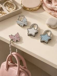 Zazumi 1pc Glitter Butterfly Star Table Bag Hanger, Polished Silver‑Tone Metal Foldable Handbag Hook, Decorative Desktop Bag Holder , Portable Table Edge Accessory Hook ,Apartment Friendly Kitchen, Travel; Great Gift For Spring Or Mother's Day. - Multicolor - View 1