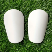 1 par de mini espinilleras de fútbol creativas, mini rodilleras deportivas para protección de piernas - Blanco - Ver 11