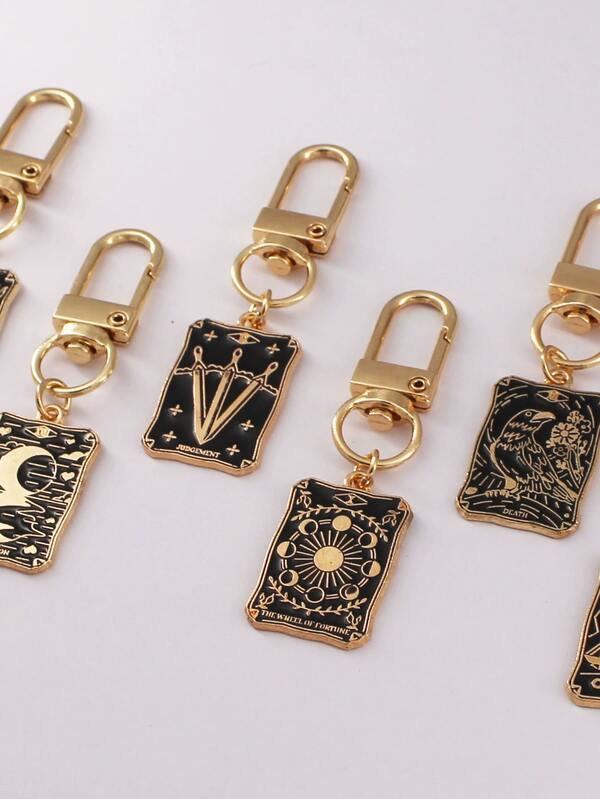 1 pièce Porte-clés pendentif de tarot doré et noir, décoration de porte-clés de style gothique créatif, pendentif de sac, cadeau parfait pour les amis, accessoire décoratif de sac, cadeau de la Saint-Valentin, accessoires de voiture, breloques de sac, porte-badges scolaires avec porte-cartes d'identité, accessoires de voiture, breloques de sac