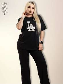 Conjunto de 2 Piezas Oversize Unicolor para Dama Mujer Amplio y Holgado de Blusa de Cuello Redondo Unicolor con estmpado LA con figuras estilo paliacate con Manga Corta y Hombros Caídos Cómoda y Pantalón Oversize Holgado Unicolor Sin Bolsillos Moda Otoño Primavera y Verano Estilo Casual y Versatil para Todo Tipo de Ocasion - Negro - Ver 1