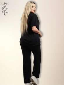 Conjunto de 2 Piezas Oversize Unicolor para Dama Mujer Amplio y Holgado de Blusa de Cuello Redondo Unicolor con estmpado LA con figuras estilo paliacate con Manga Corta y Hombros Caídos Cómoda y Pantalón Oversize Holgado Unicolor Sin Bolsillos Moda Otoño Primavera y Verano Estilo Casual y Versatil para Todo Tipo de Ocasion - Negro - Ver 2