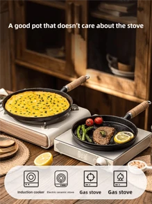1 pièce Poêle à frire en fonte de 7,87/10,23 pouces avec un manche en bois. Elle a une surface antiadhésive et convient pour la préparation d'omelettes et de crêpes. C'est un ustensile de cuisine polyvalent pour le petit-déjeuner et la préparation de crêpes.